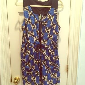 Cute nylon dress with pockets.